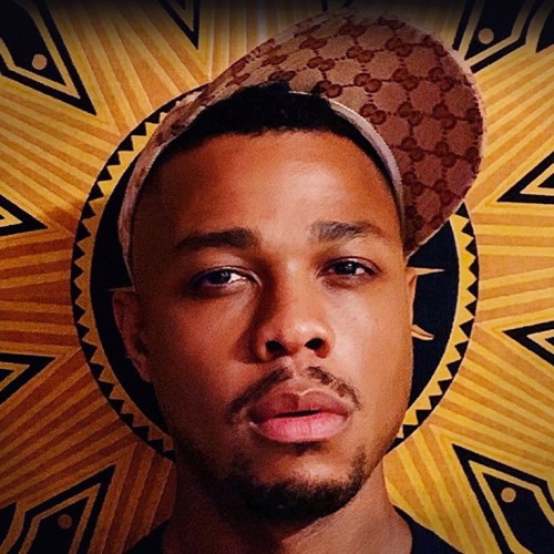 a young Black man with a thin mustache and gucci hat, askew, against a graphic that surrounds him like a sunburst