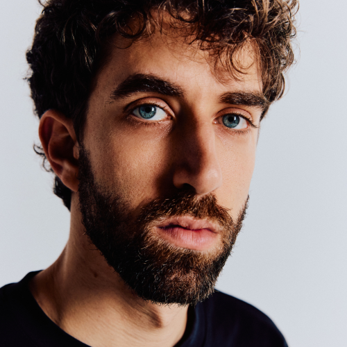 guitarist ely perlman, portrait with electric and acoustic instruments