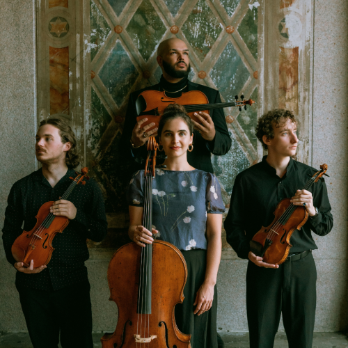 the isidore quartet, in a dark outdoor portrait