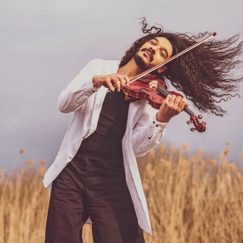 violinist Nemanja Radulovic, outdoor portrait with violin