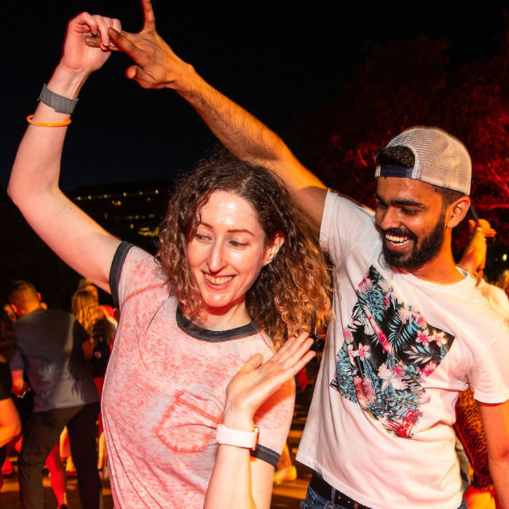 a woman and man dance at Let's Dance Boston