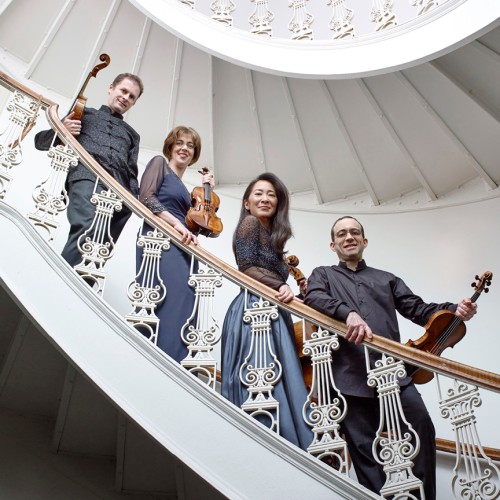 Brentano String Quartet, group photo on curved staircase