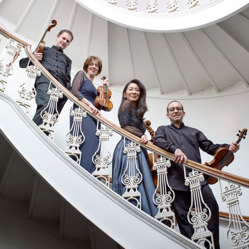 Brentano String Quartet, group photo on curved staircase