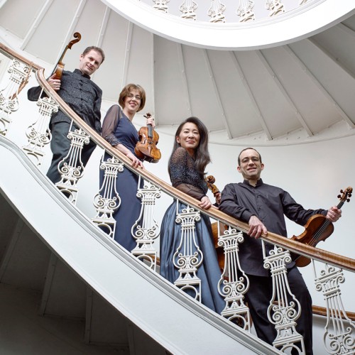 Brentano String Quartet, group photo on curved staircase
