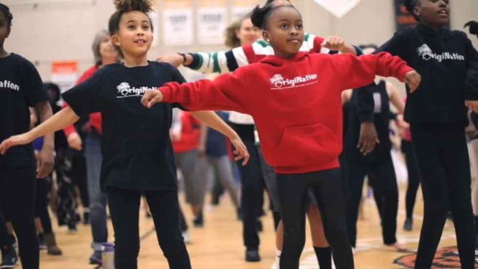 people of all ages and abilities enjoy a dance class