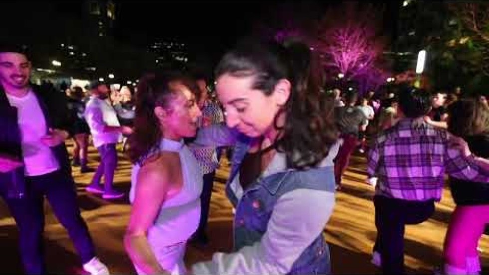 An outdoor mambo dance party