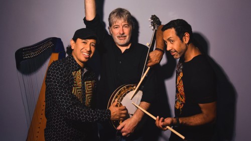 Béla Fleck, banjo; Edmar Castañeda, harp; Antonio Sánchez, drums — group portrait