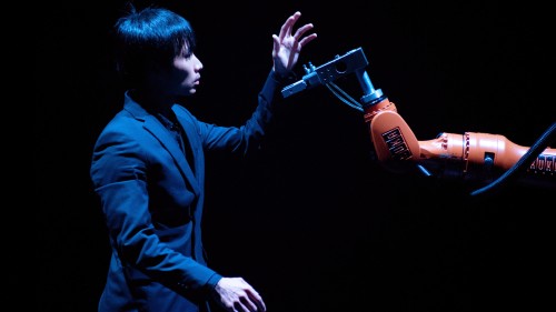 Huang Yi dancer performing with KUKA robotic arm
