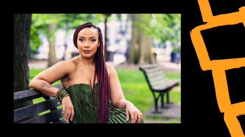 Zahili Zamora, a Cuban woman with long dark red braids, sits on a bench in a park in the spring, she wears a green strapless dress
