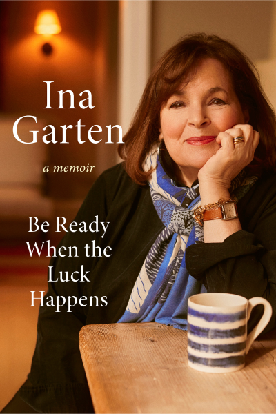 book cover with title "be ready when the luck happens" with ina garten smiling as she cups her chin in her hand